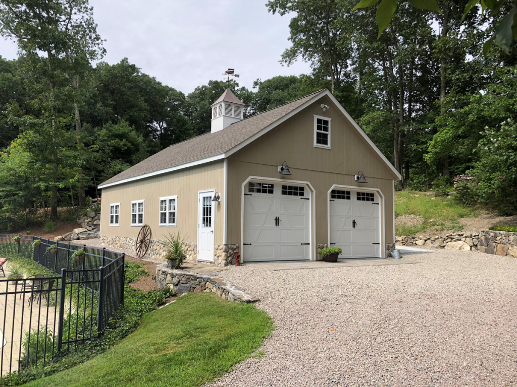 24’ x 40’ 8 Pitch Garage built on top of customer’s 22’’ high stem wall. Shown with optional 9’ x 8’ Custom Carriage Doors and 42’’ Elite Cupola