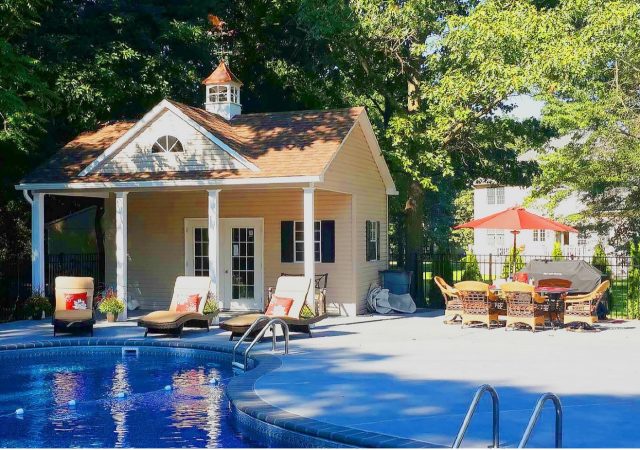 pool house with outdoor furniture