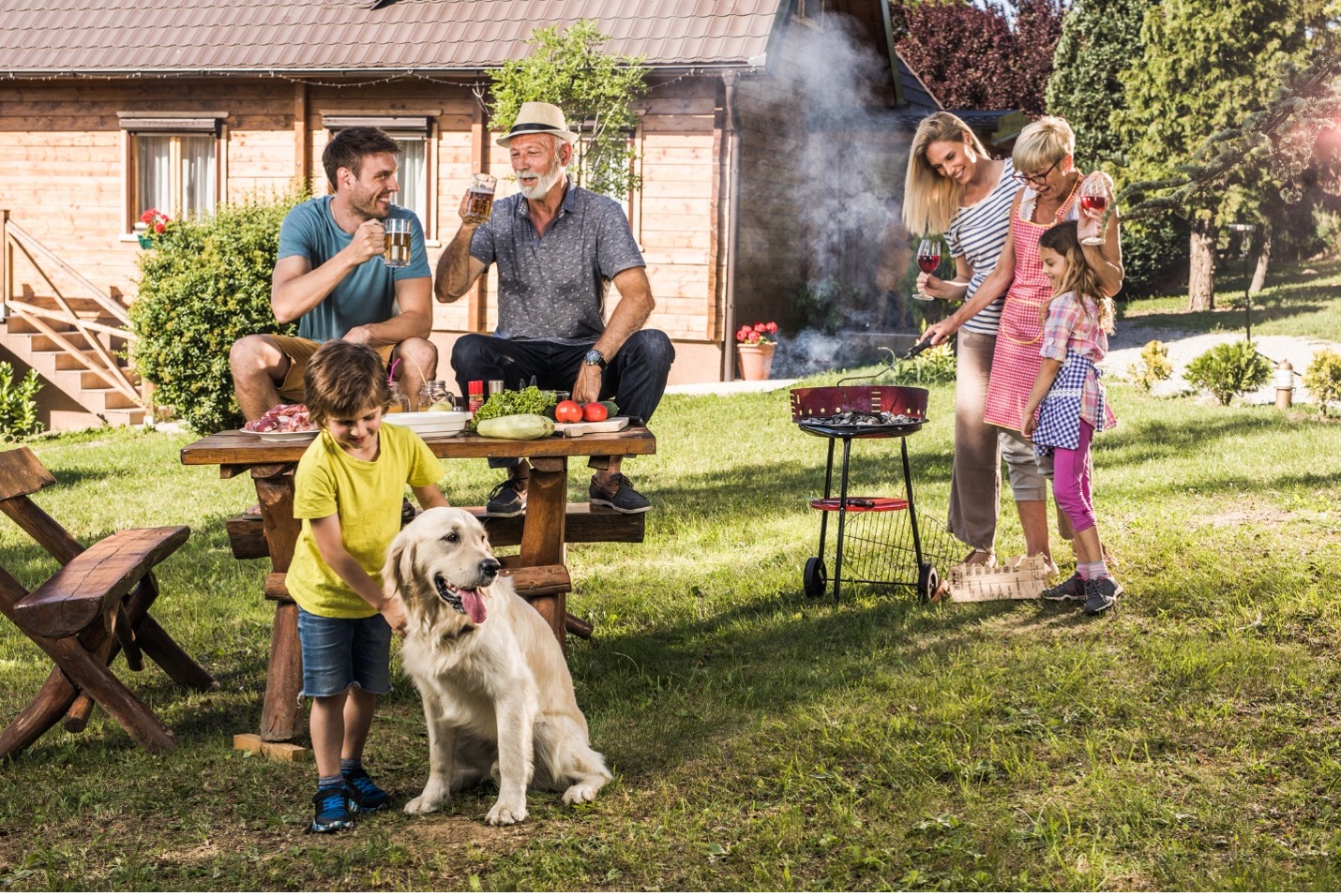 dog in backyard with family