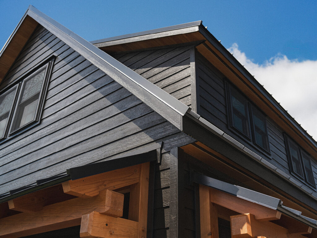 If you’ve been eyeing one of our premium timber frame garages, you’ll love the Ridgeview Loft. At first glance, its striking design, complete with pent roofs over the garage and entry doors, gives it the sophisticated look of a timber frame build. But this model doesn’t just look upscale—it delivers. With glass panel garage doors, black-trimmed windows, and a standing seam metal roof, the Ridgeview Loft checks all the boxes for modern, high-end appeal. When compared to our classic 2-story A-frame garage, the Ridgeview Loft clearly sets itself apart. Its steeper pitched roof and extended dormers make the second floor dramatically more spacious and versatile. Whether you're envisioning turning this space into a mancave, home office, art studio, or guest space, the Ridgeview Loft offers the flexibility to bring your vision to life—while maintaining exceptional value.