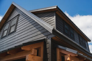 If you’ve been eyeing one of our premium timber frame garages, you’ll love the Ridgeview Loft. At first glance, its striking design, complete with pent roofs over the garage and entry doors, gives it the sophisticated look of a timber frame build. But this model doesn’t just look upscale—it delivers. With glass panel garage doors, black-trimmed windows, and a standing seam metal roof, the Ridgeview Loft checks all the boxes for modern, high-end appeal. When compared to our classic 2-story A-frame garage, the Ridgeview Loft clearly sets itself apart. Its steeper pitched roof and extended dormers make the second floor dramatically more spacious and versatile. Whether you're envisioning turning this space into a mancave, home office, art studio, or guest space, the Ridgeview Loft offers the flexibility to bring your vision to life—while maintaining exceptional value.